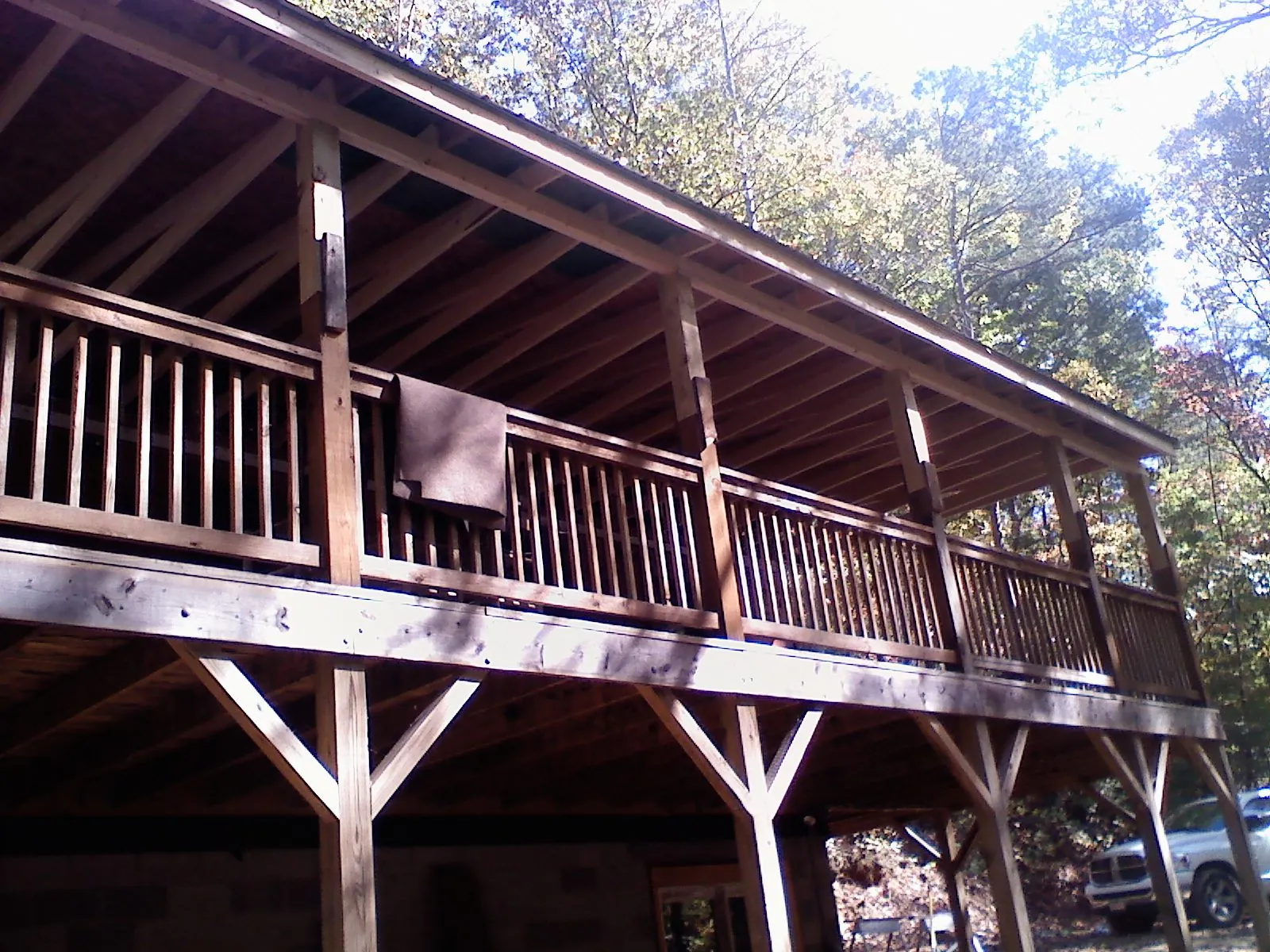 Timber framing under a new elevated porch and deck — Roof Leak Repair in Delanson by Roofing Brothers